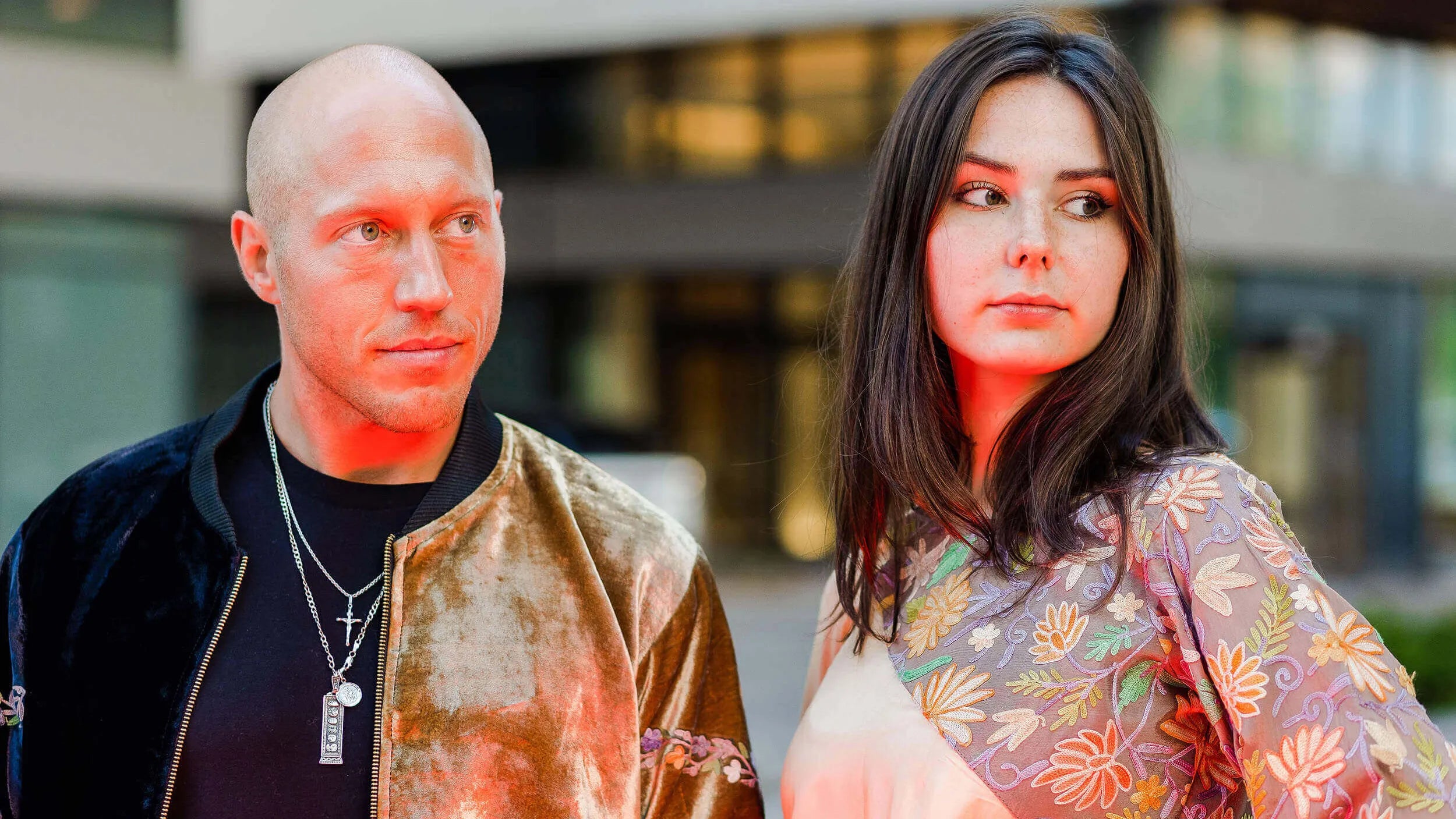 man and women standing together posing